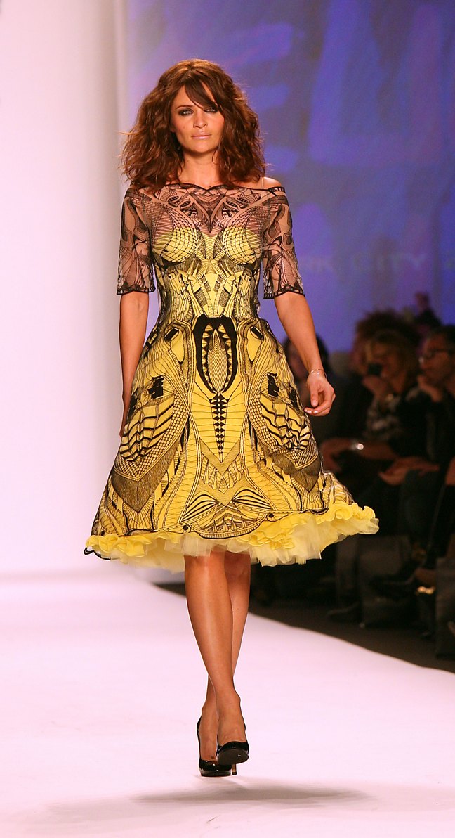 Helena Christensen yellow and black designer dress, black high heels